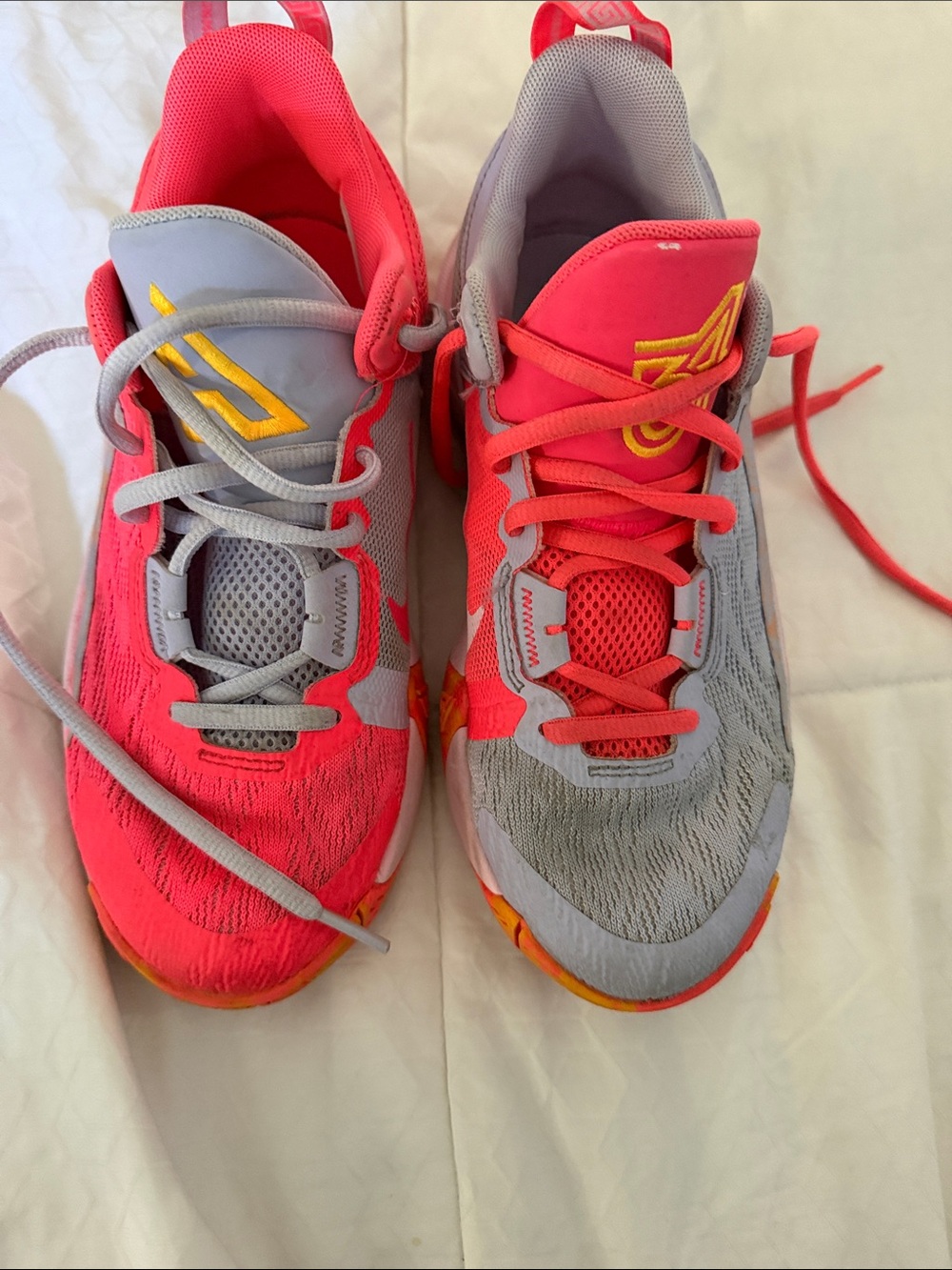 Nike Giannis Immortality Sneakers in Coral Pink and Gray with Yellow Accents